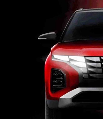Vehicle front with exterior trim and lighting