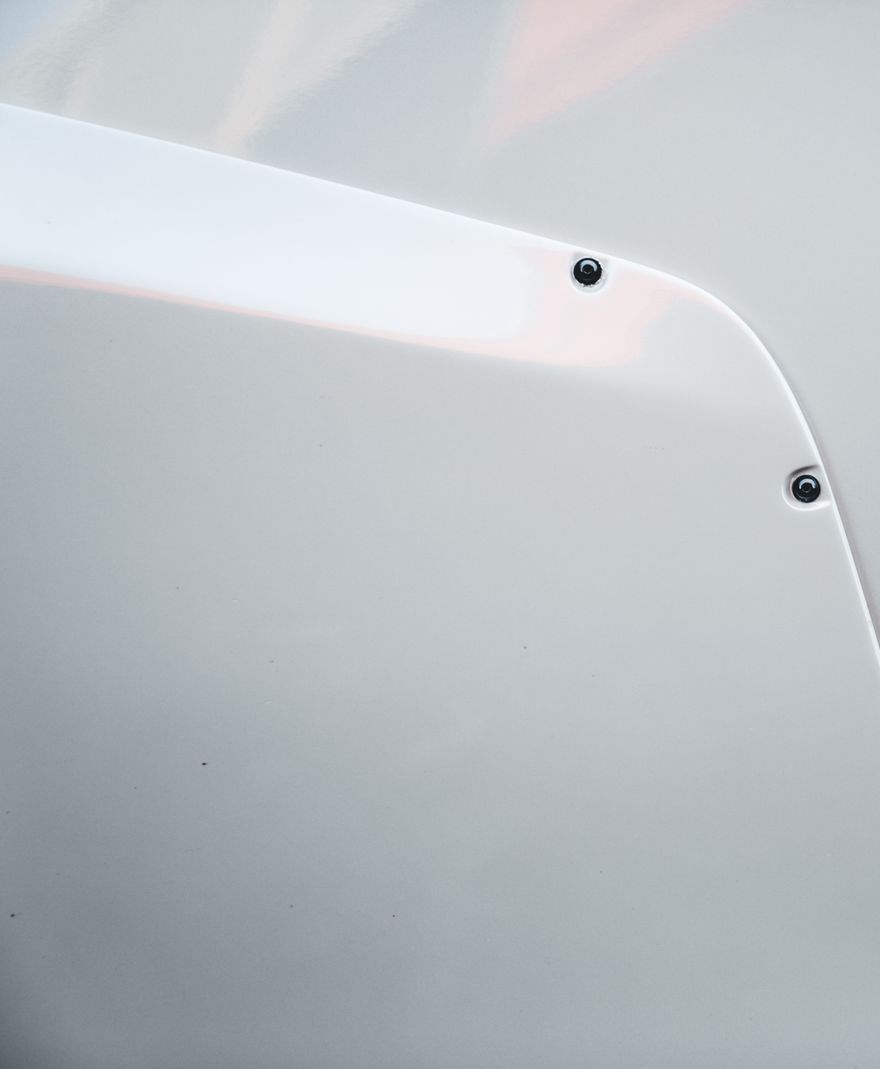 Painted high-gloss exterior plastic surface