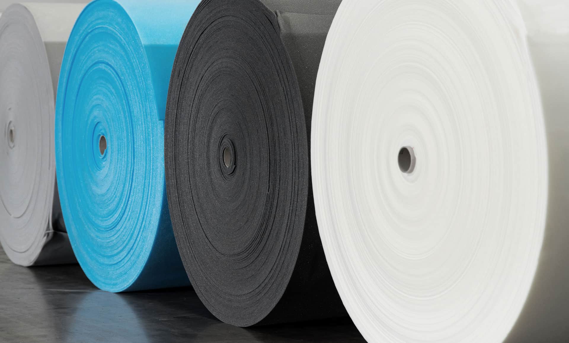 Lightweight acoustic foam used in vehicle floor constructions