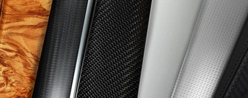 Wood, carbon-fiber, metal and synthetic interior surface samples